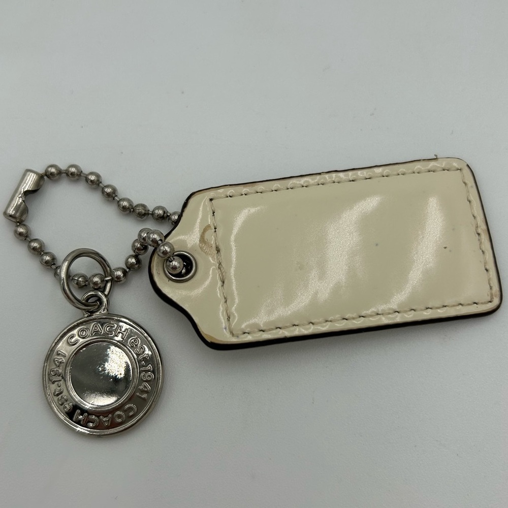 Coach Cream and Silver Disc Purse Charm Tag - Picture 3 of 3